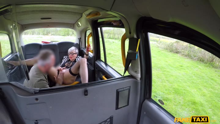 FakeTaxi Tattooed MILF drains cabbies balls